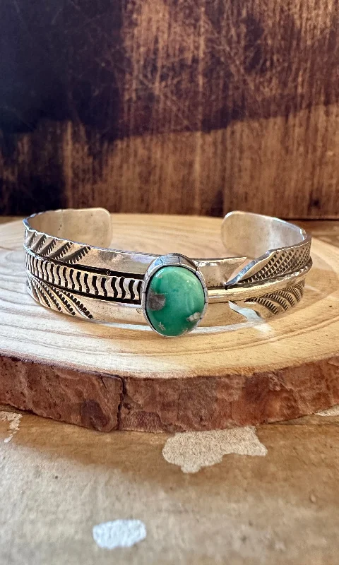 bohemian style bangles -RICK ENRIQUEZ TURQUOISE Broken Arrow Feather Cuff 26g