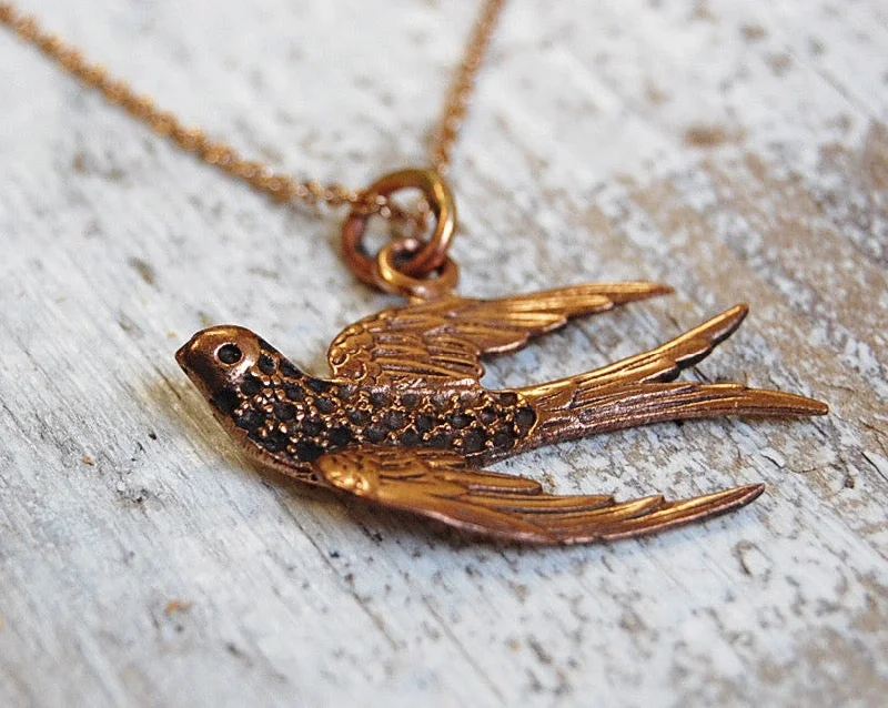 delicate pendant necklaces -'Vintage bird' necklace | bronze